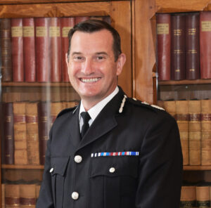 Sir John Robins QPM DL profile photo