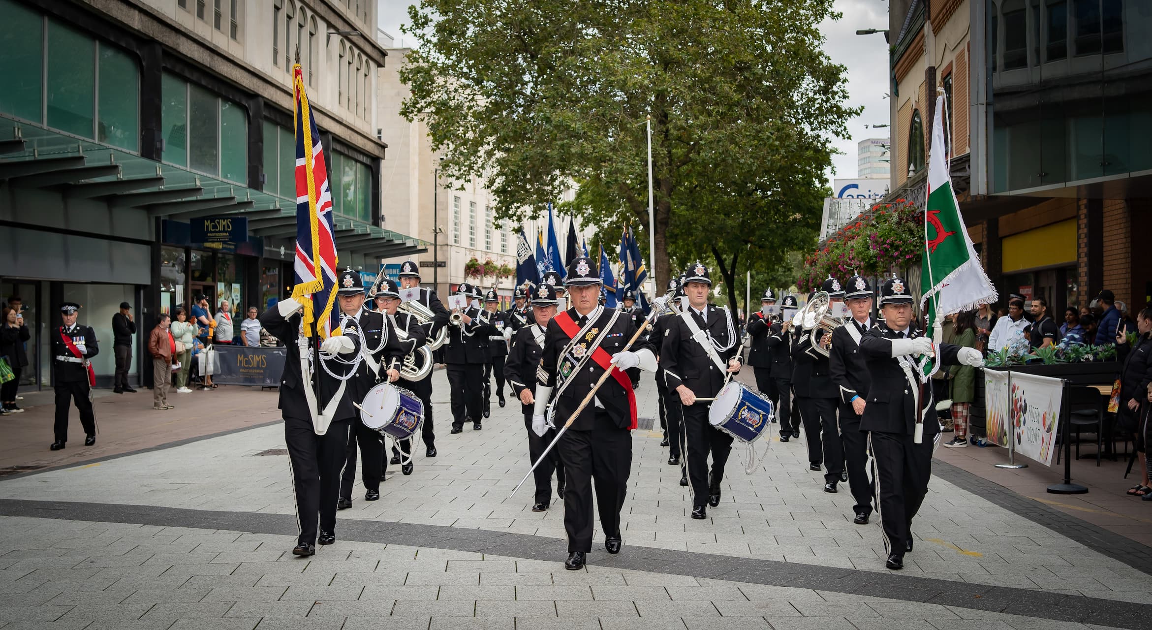 Officers marching in Cardiff as part of National Police Memorial Day 2023